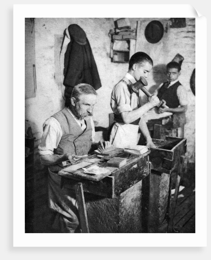 Gold-beating in a London workshop by Anonymous