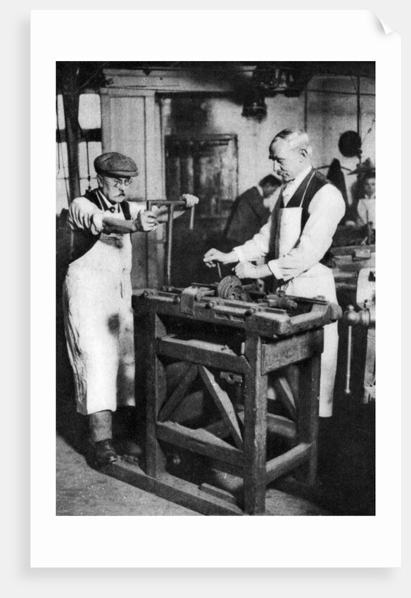 Cutting a key barrel, London by Anonymous