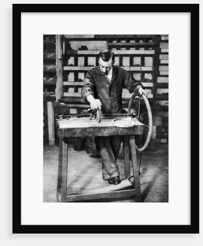 Wire being wound into springs for spring-locks, London by Anonymous