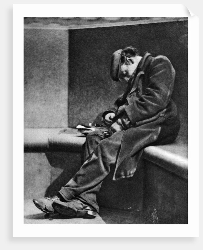 A man sleeping on Blackfriars Bridge, London by Walter Benington