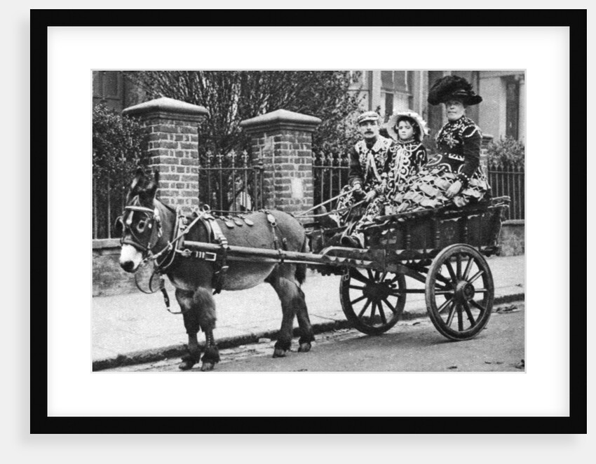 Pearly family in their donkey-drawn 'moke', London by McLeish