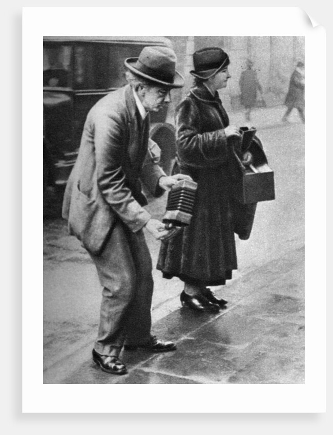 Kerb-side concertina-player, Holborn, London by Anonymous