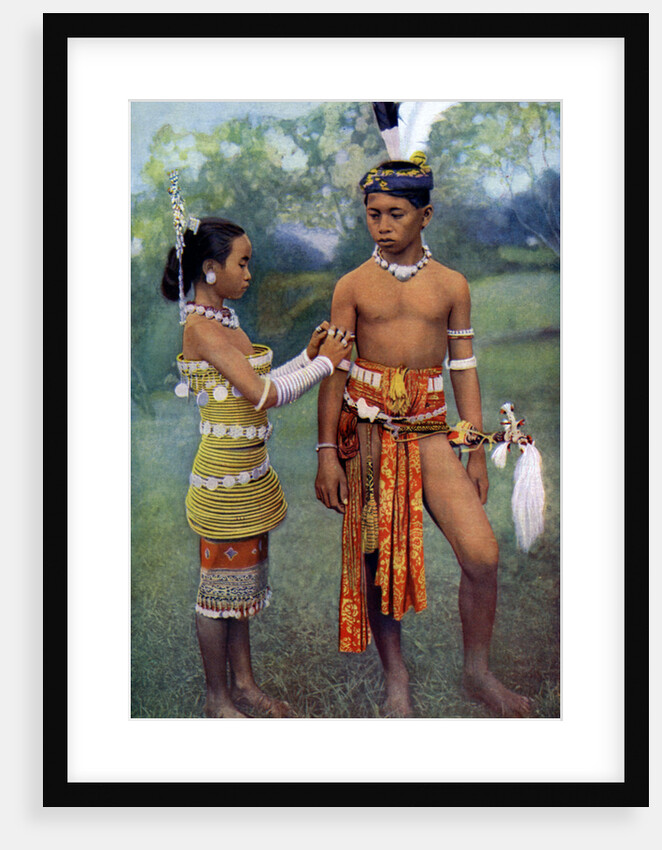 Young Iban or Sea Dayaks people in gala attire, Borneo by Dr Charles Hose