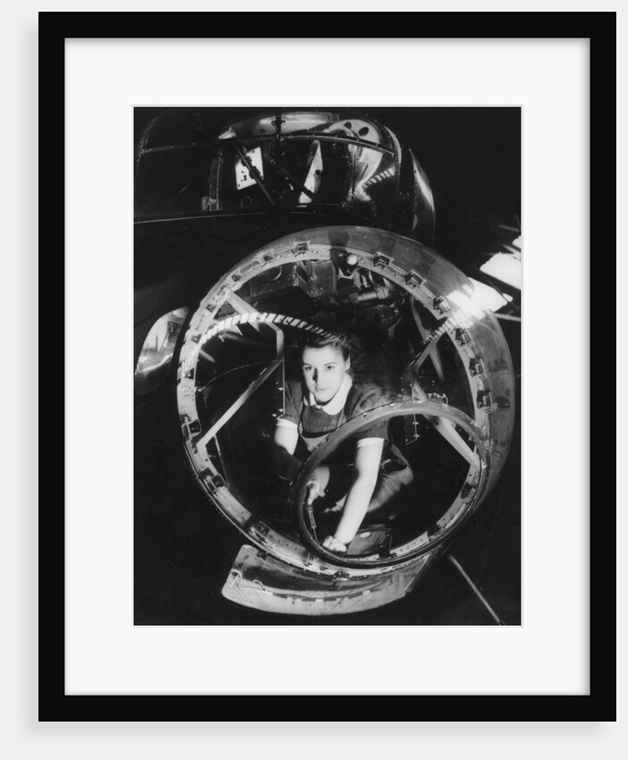 A woman working on a Lancaster bomber, Second World War by Anonymous