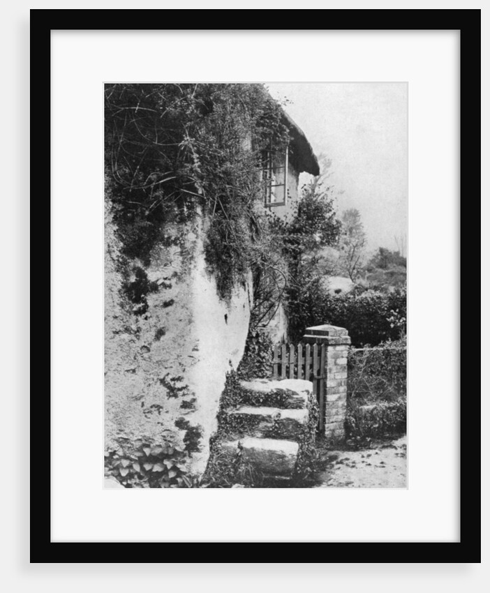 A cottage with an ancient 'upping stock', Cockington, Devon by HJ Smith