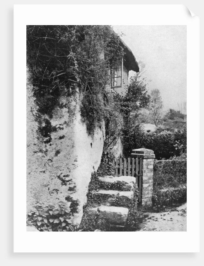 A cottage with an ancient 'upping stock', Cockington, Devon by HJ Smith