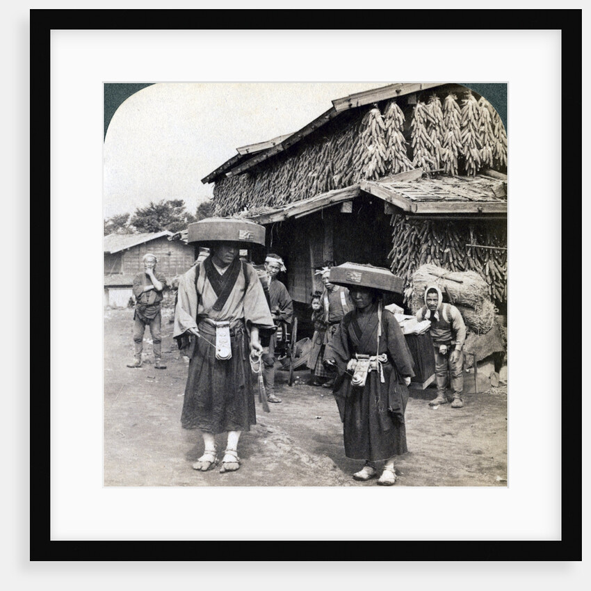 Pilgrim beggars beating little gongs, near Lake Kawaguchi, Japan by Underwood & Underwood