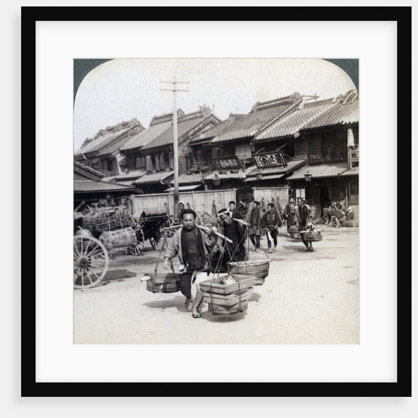 Coolies, street scene in Tokyo by Underwood & Underwood