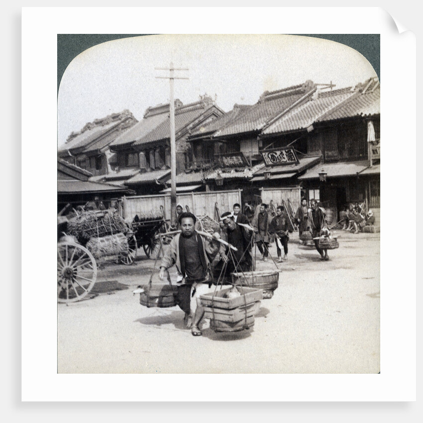 Coolies, street scene in Tokyo by Underwood & Underwood