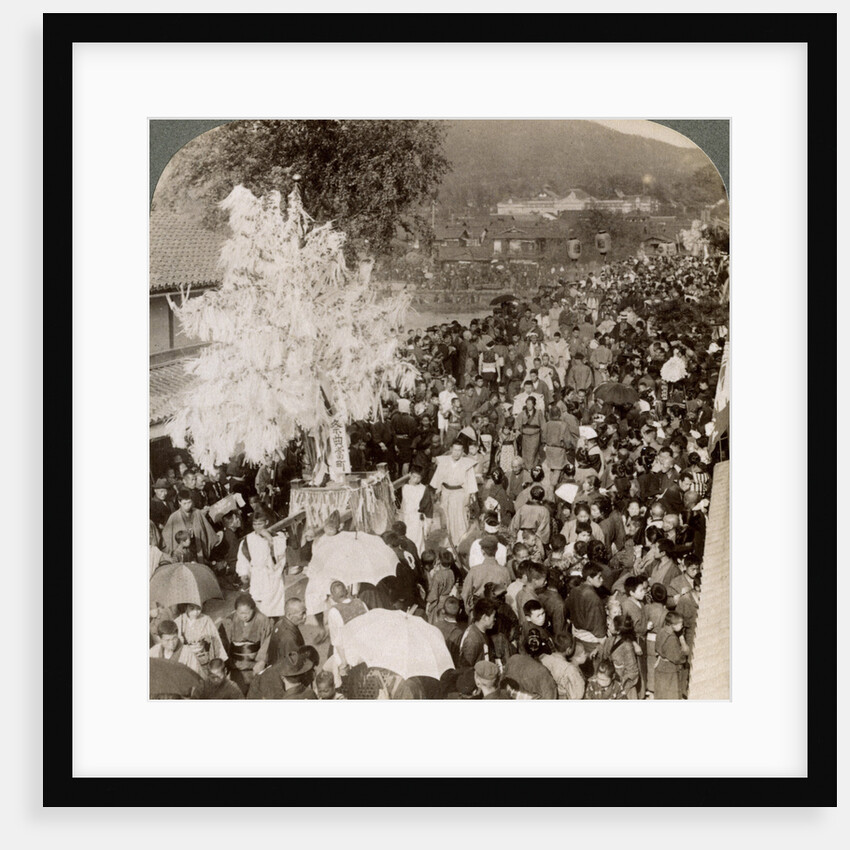 Shinto procession carrying sacred objects over a bridge to the Imperial Museum, Kyoto, Japan by Underwood & Underwood