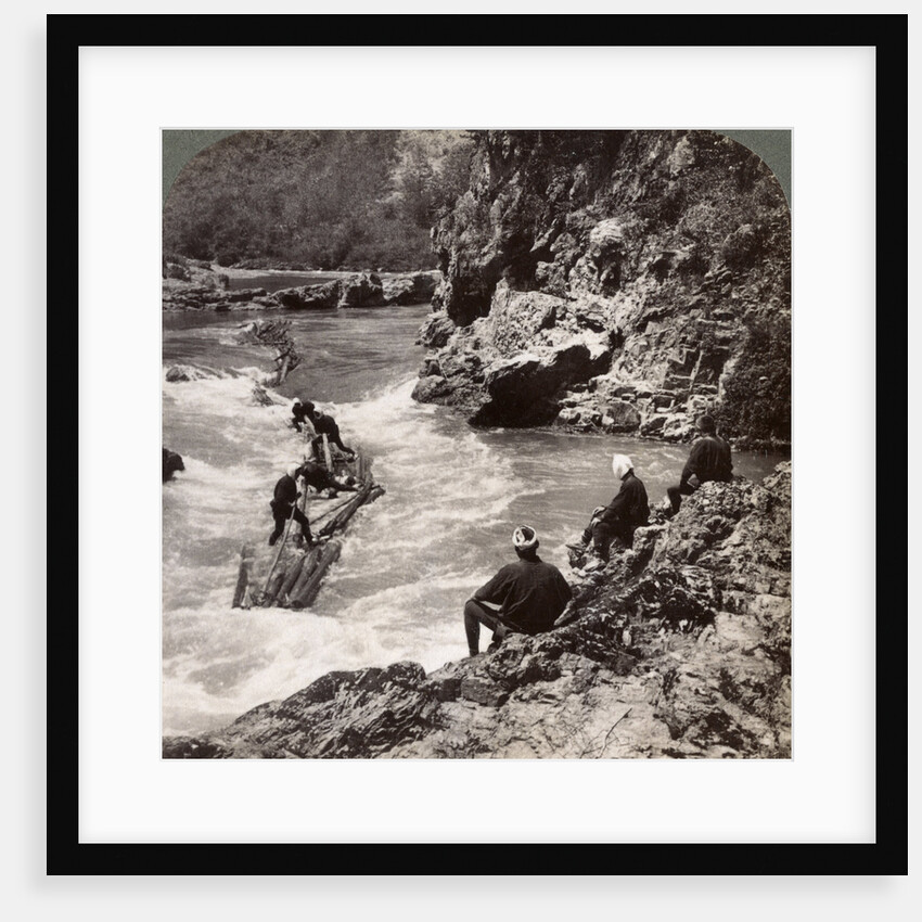 Men on a log raft, shooting the Hozu Rapids on the Katsura River, Kyoto, Japan by Underwood & Underwood