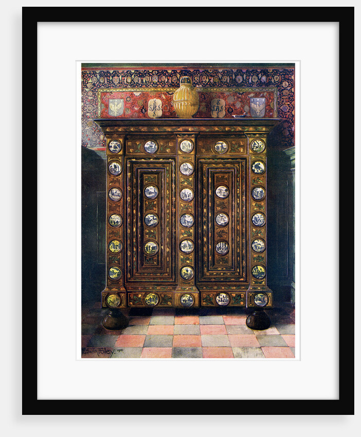 Walnut kas inlaid and with painted medallions of Delft ware by Edwin Foley