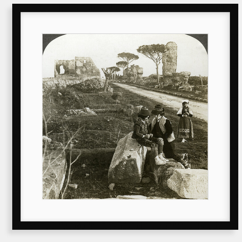 Tombs and children in traditional dress, Appian Way, Rome, Italy by Underwood & Underwood