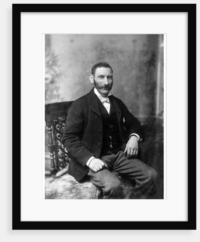 Man sitting in a chair by Theodore Waltenberg