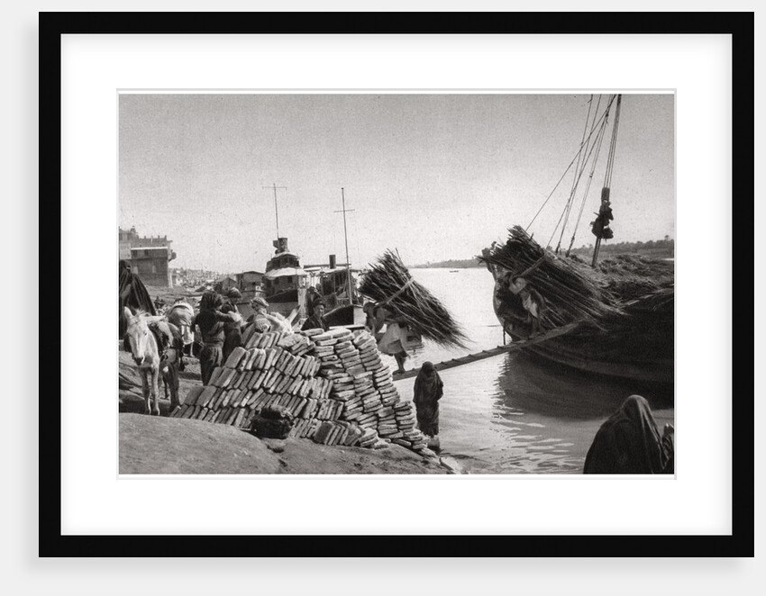 Unloading cargo from a boat, Muhaila, Baghdad, Iraq by A Kerim