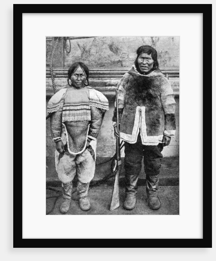 Eskimo hunter and his wife in winter costume by Brown Bros