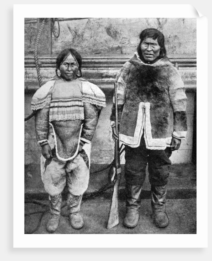 Eskimo hunter and his wife in winter costume by Brown Bros