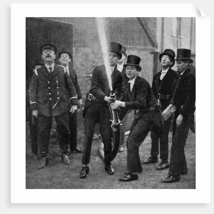 Eton's amateur firemen practising a hose drill, Berkshire by Anonymous