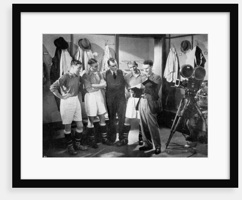 A pause for instruction from film producer Anthony Asquith, Twickenham, London by Anonymous