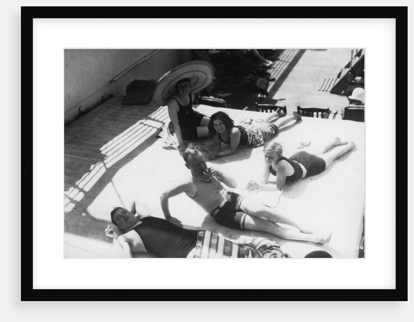 Passengers sunbathing on board a cruise ship by Anonymous