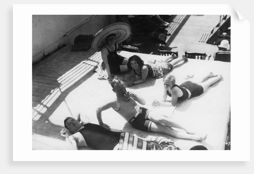 Passengers sunbathing on board a cruise ship by Anonymous