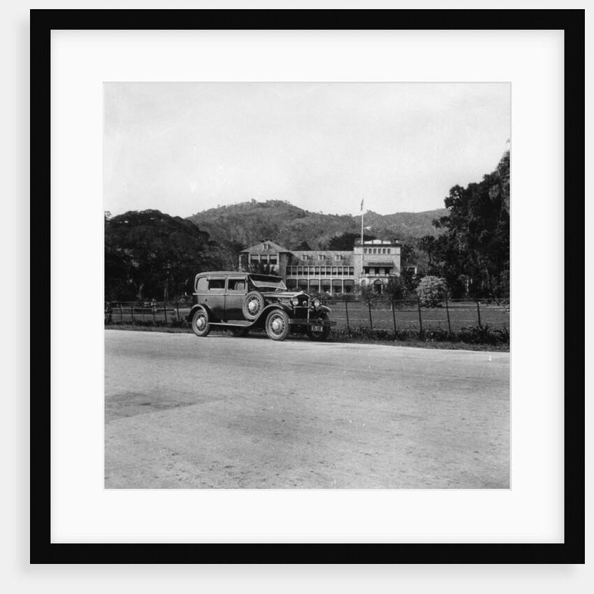 A Singer car in front of the Governor's house, Trinidad, Trinidad and Tobago by Anonymous