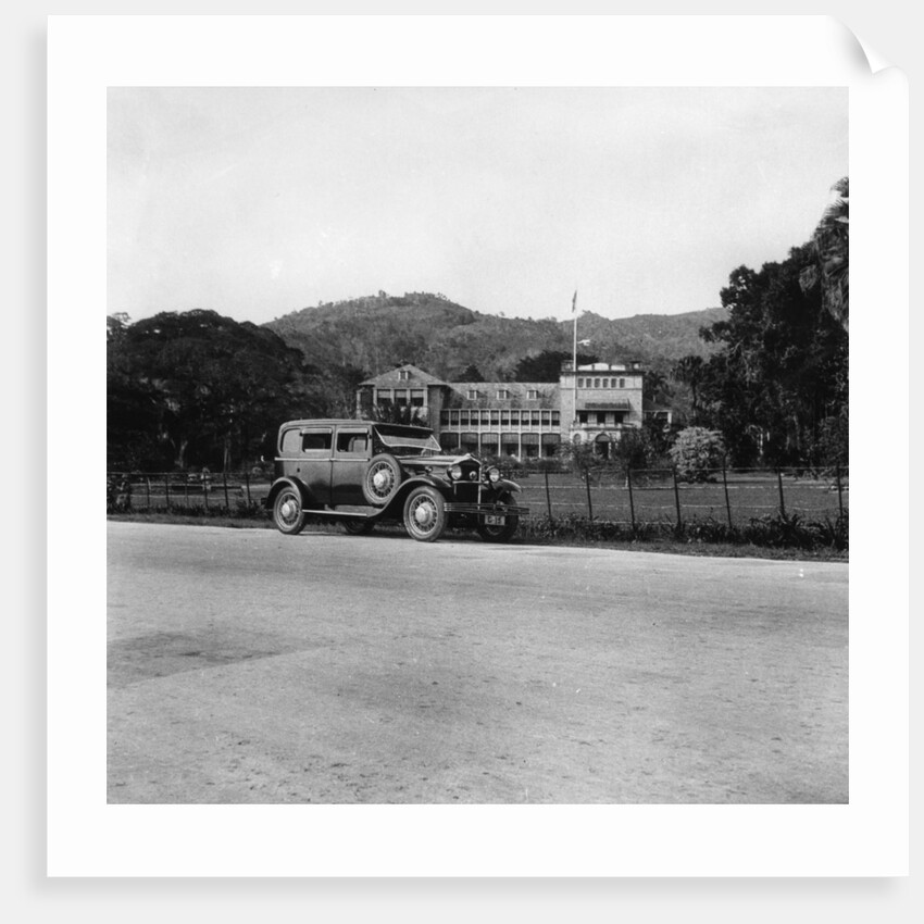 A Singer car in front of the Governor's house, Trinidad, Trinidad and Tobago by Anonymous