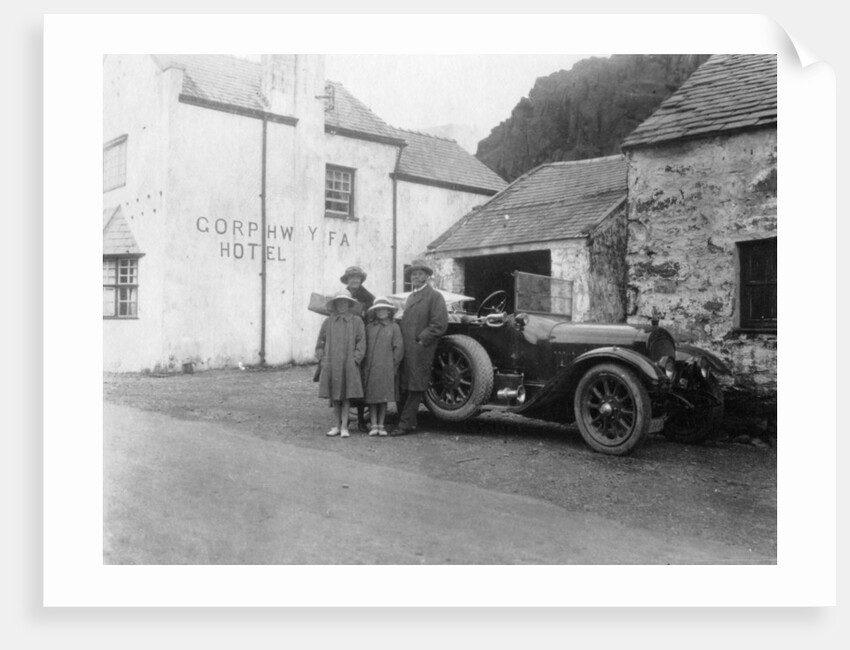 A family standing beside their car, Gorphwysfa Hotel, North Wales by Anonymous