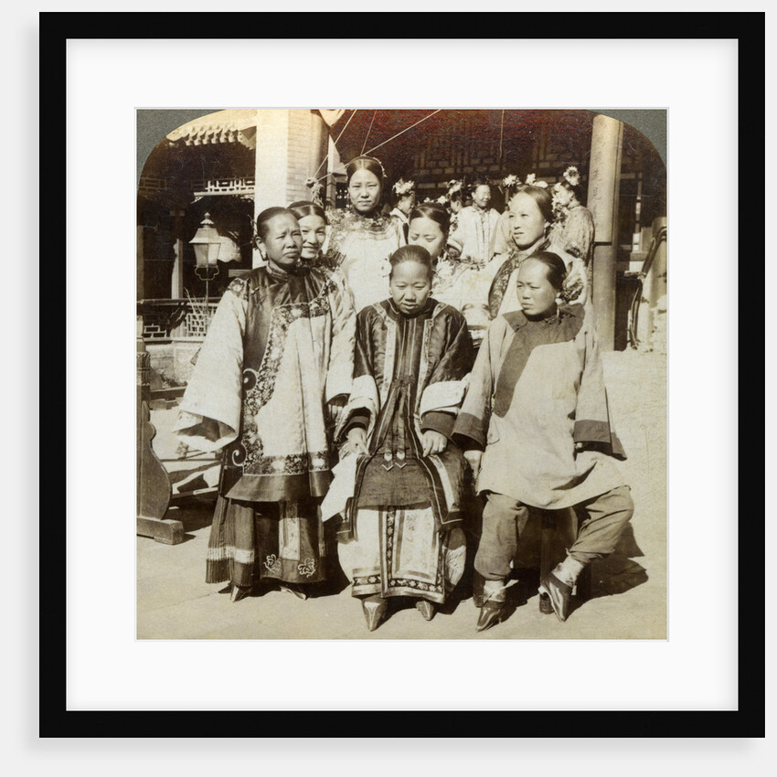A group of women in the courtyard of a wealthy Chinese house, Peking, China by Underwood & Underwood