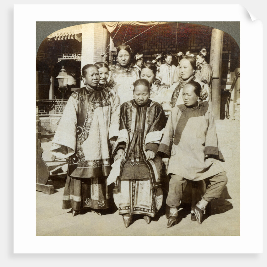 A group of women in the courtyard of a wealthy Chinese house, Peking, China by Underwood & Underwood