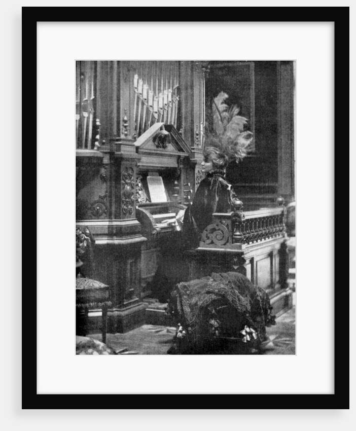 The Queen of Romania playing the organ by Anonymous