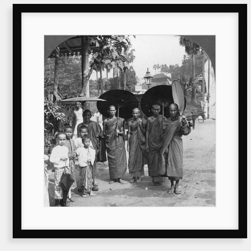 Buddhist monks with sunshades and fans, Rangoon, Burma by Stereo Travel Co