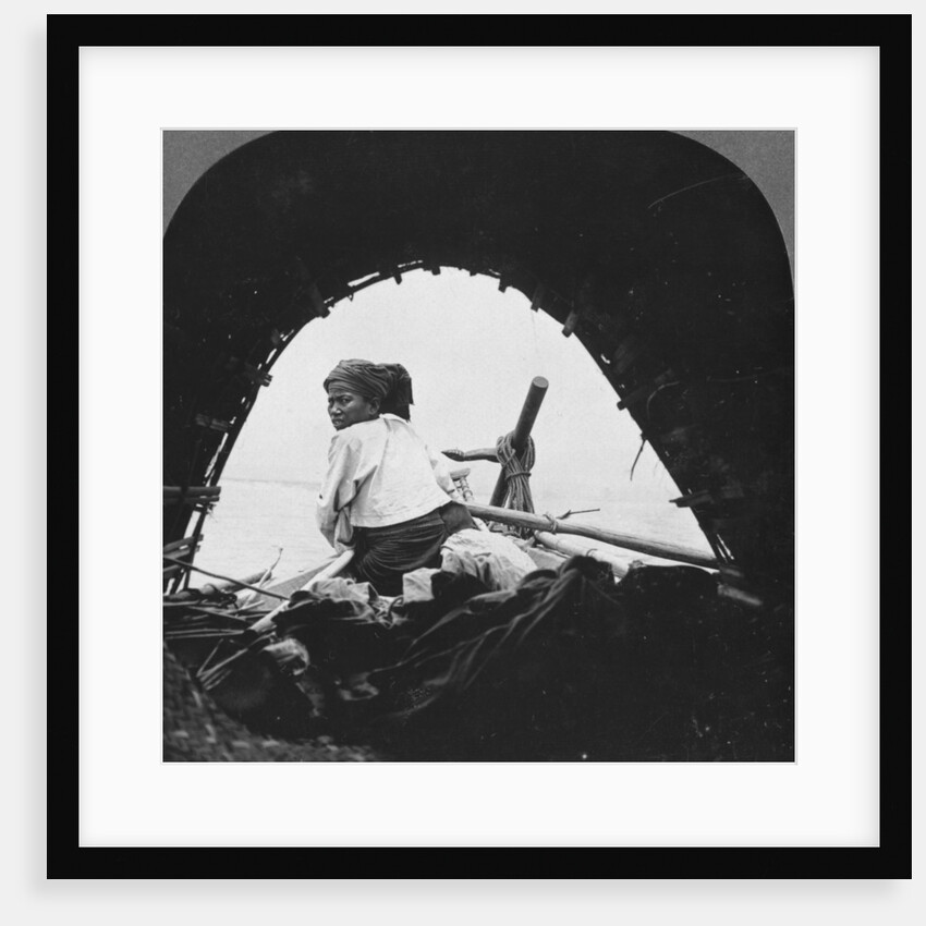 A boatman on the Irrawaddy River, Burma by Stereo Travel Co