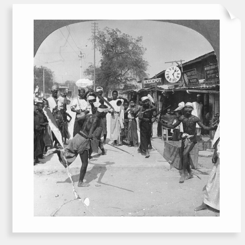 Young men performing a sword dance, Burma by Stereo Travel Co