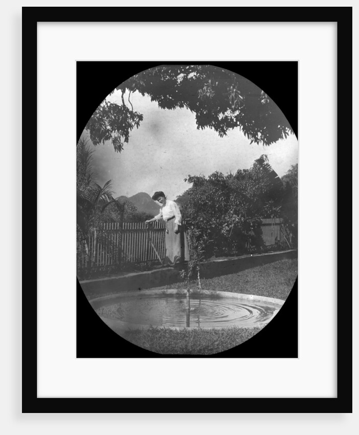 Woman by a pond in a garden, Rio de Janeiro, Brazil by Anonymous