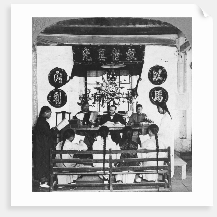 Interior of a schoolroom at Peking University, China by CH Graves