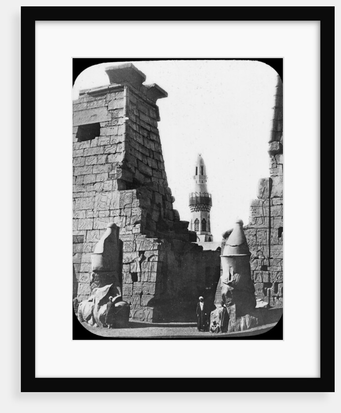 Minaret and ruins of Luxor Temple, Luxor, Egypt, c1890. Lantern slide by Newton & Co