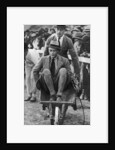 Louis Mountbatten wheels his cousin, the Prince of Wales, at a gymkhana in Malta by Anonymous