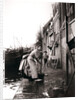 Woman mopping the street, Dordrecht, Netherlands by James Batkin