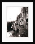 Woman mopping the street, Dordrecht, Netherlands by James Batkin