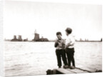 Boys by a canal, Laandam, Netherlands by James Batkin