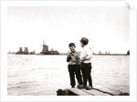 Boys by a canal, Laandam, Netherlands by James Batkin