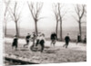 Children running alongside a canal, Monnickendam, Netherlands by James Batkin