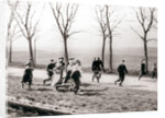 Children running alongside a canal, Monnickendam, Netherlands by James Batkin