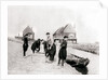Men and boys in traditional costume by a canal bank, Marken Island, Netherlands by James Batkin