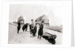 Men and boys in traditional costume by a canal bank, Marken Island, Netherlands by James Batkin
