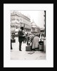 Woman polishing shoes, Brussels by James Batkin