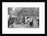 Motors and cycles in Kensington High Street, London by Percy Spence
