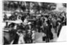 Crowds in front of the station, Orsay, Paris by Ernest Flammarion