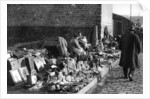 A display of goods at the flea market, Paris by Ernest Flammarion
